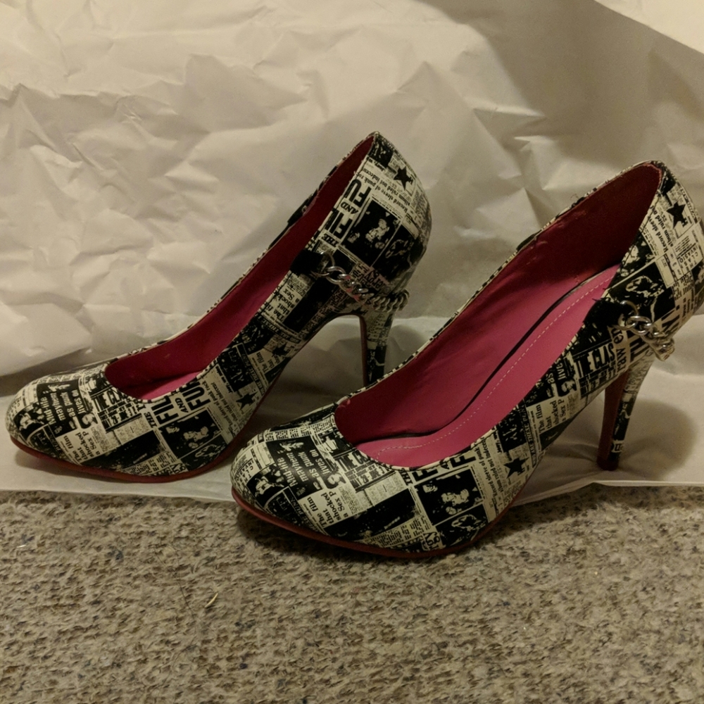 Tuk shoes newspaper heels with chain detail. Bn